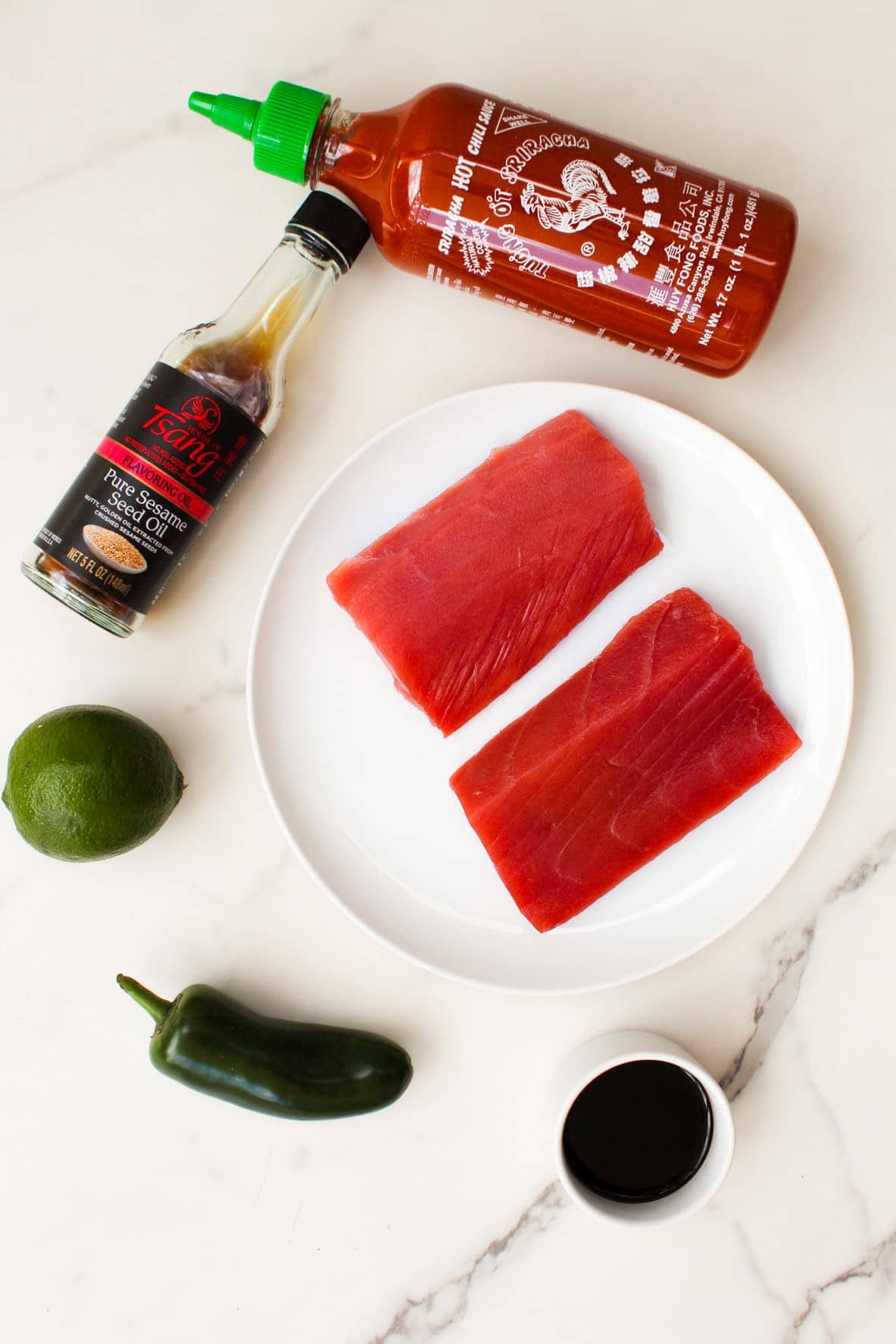 Ahi Tuna Taco ingredients on a marble surface.