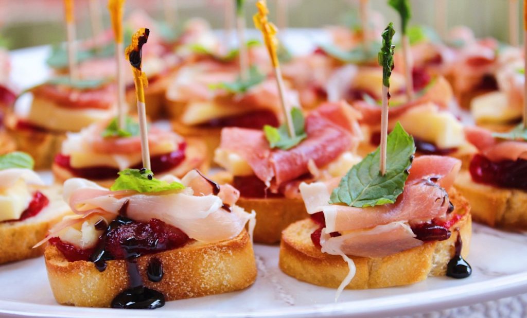Brie & Prosciutto Crostini with Cranberry and Mint