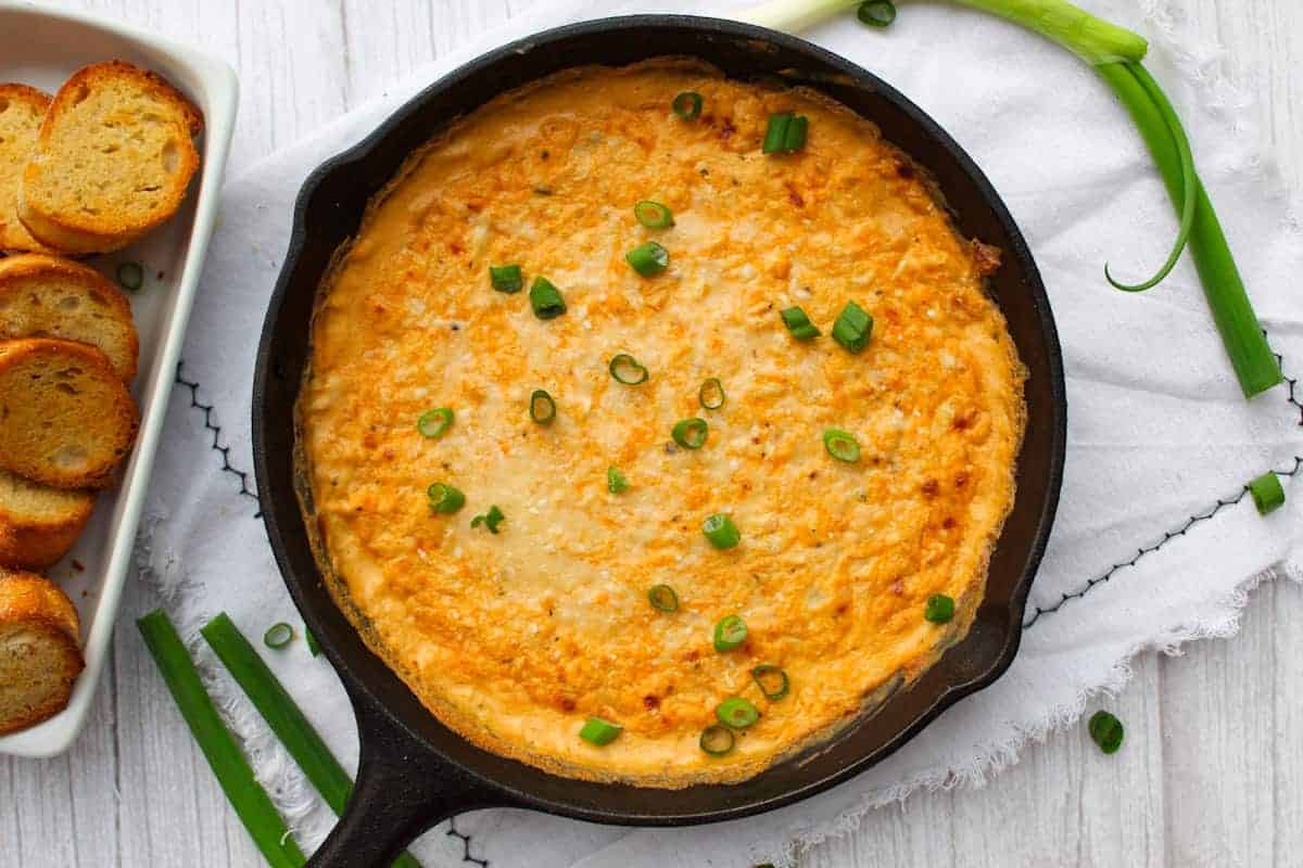 Hot Cajun Crab Dip served in cast-iron skillet.