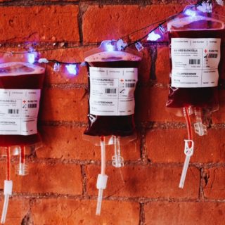 Blood Bag Halloween Cocktails hung up