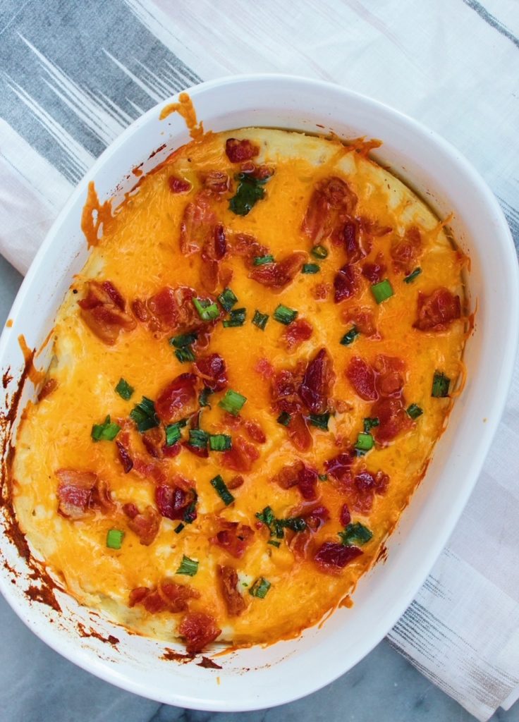 top with cheese, bacon and green onion