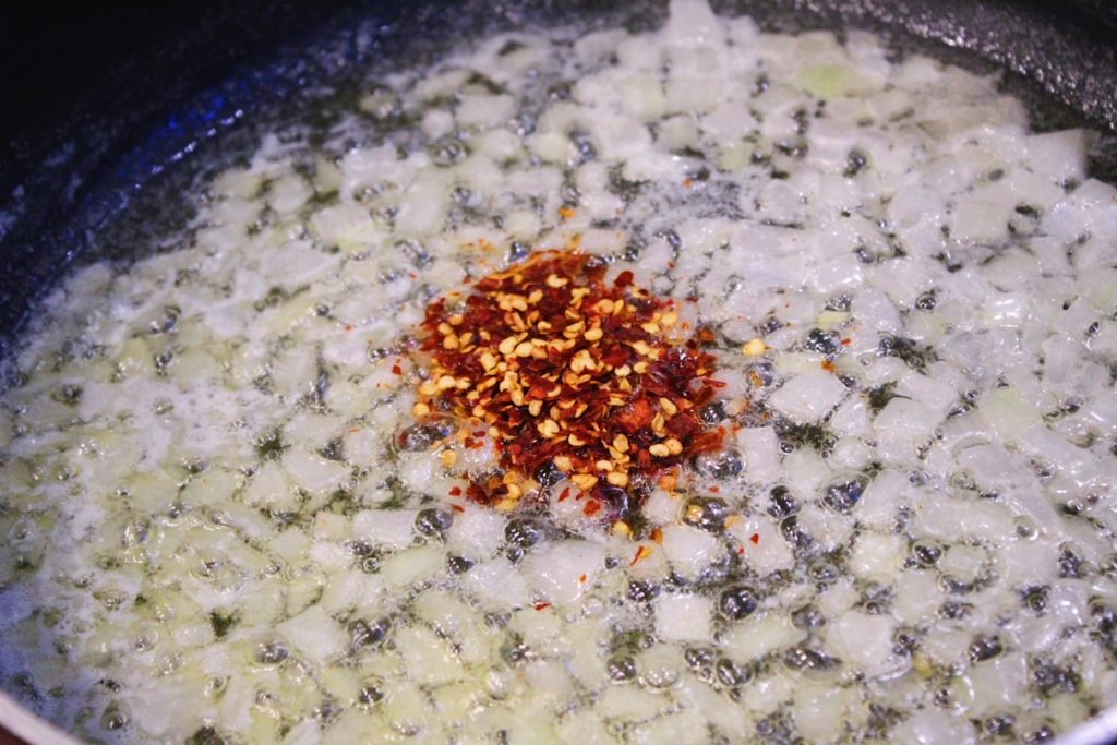 onions, garlic and red pepper flakes